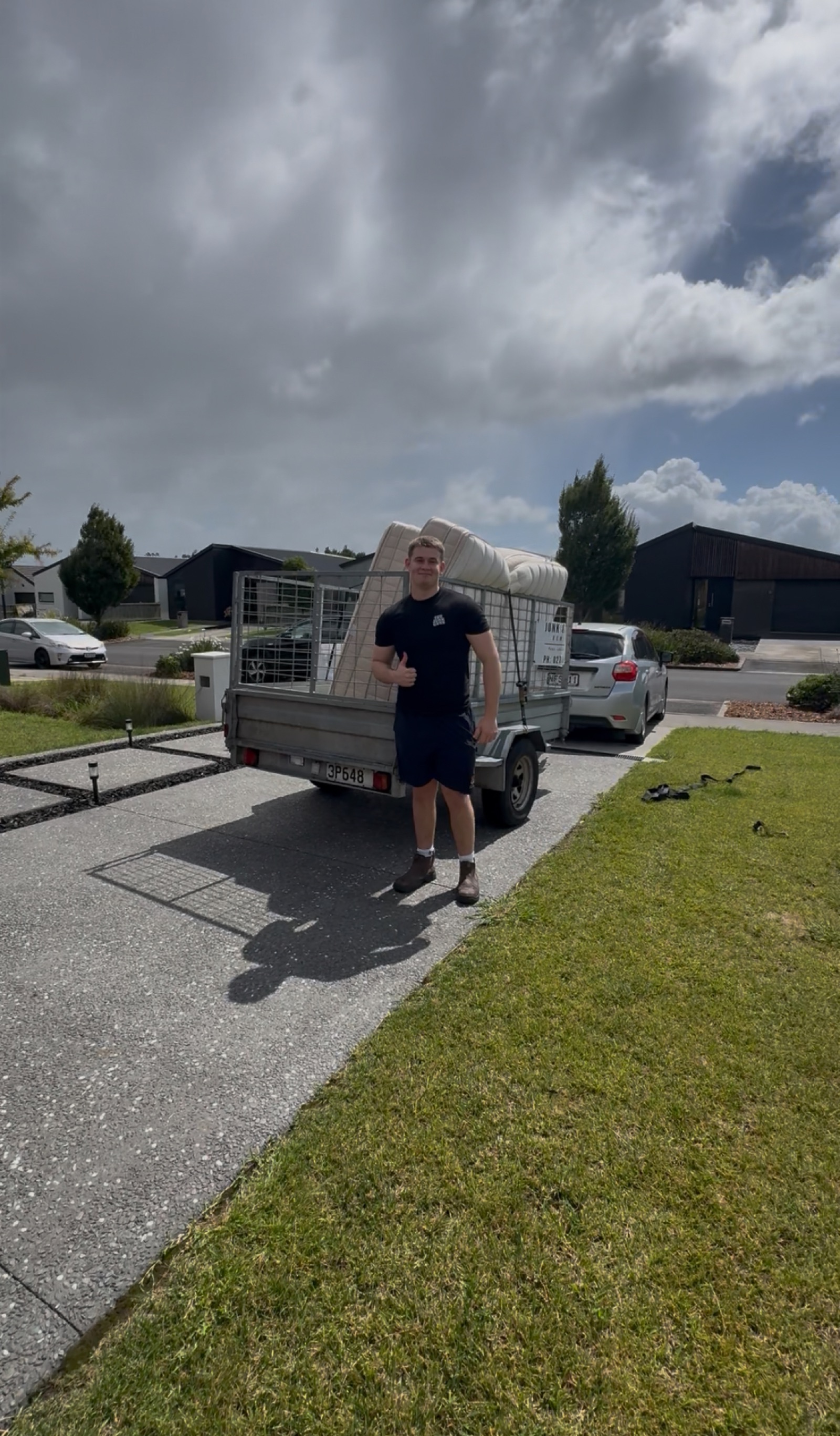 Ryan with a loaded trailer at a clean job site